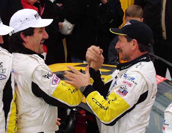 Picture of Dale and Corvette C5-R driver, Ron Fellows sharing a congratulatory handshake upon winning the 2001 Rolex 24 Hours at Daytona race.