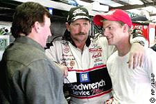 Picture of Dale standing with his arm around Dale Jr.