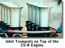This picture show the trumpet-like air inlets on top of the C5-R racecar's engine.