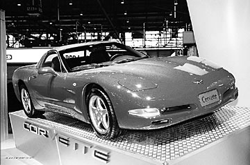 Today the nation's highest-volume Chevrolet dealers begin
selling '97 Corvettes, the first full redesign of the car in 13 years.
The rest - including all Hawaii dealers - have to wait
until production ramps up.