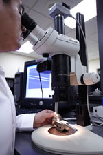 In the Del West Inspection Department, this powerful, stereo microscope is being used to view the surface of a valve stem.
